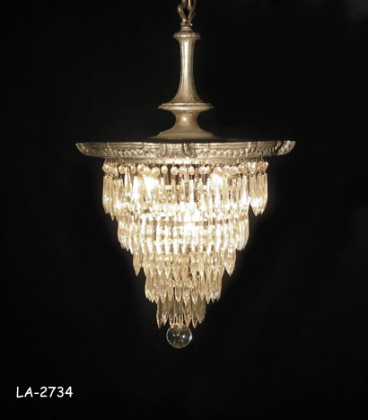 BASKET CHANDELIER: Embossed silver plate w/4-tiered concentric drop rigs over 3 sockets. 18"Dia X 24"H.
