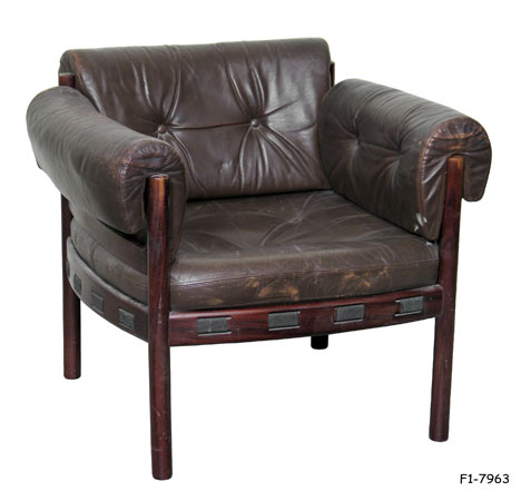 CLUB CHAIR: 1970's Modern, Dark brown Leather with button tufted Seat, Back & Saddle Padded Arms, Rosewood stained wood frame with Cylinder shaped legs, 29 x 27 x 28"H CRACKED AND WORN UPHOLSTERY!!