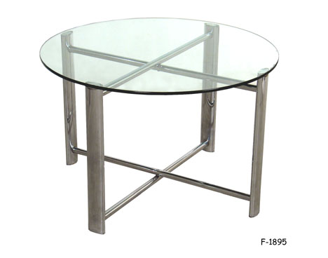 COFFEE TABLE: 1970's, Oval polished chrome legs with X-shaped stretchers. W/ 30" dia. x 3/8" thick glass top.