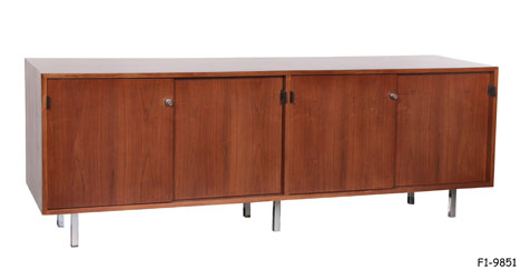 CREDENZA: "Knoll" C. Mid 1960's, Dark Walnut with Four Sliding Door-Each with Dark Brown Leather Tab Pull, Interior Includes 1 Deep Drawer at Left End and One at Right End, Left Center with 4 Shallow Drawers & 1 Drawer at Center Right, 6 Short, Square Tubular Chrome Legs, 71-3/4" x 17-3/4" x 27-1/2"H SPECIAL PACKING