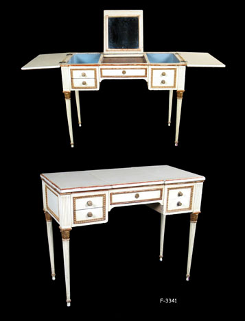 DRESSING TABLE: Antique Late 19th C. French, Louis XVI Style, Ivory with Brown Gilt trim, Lift-up mirror, fold-up side leaves, blue slub silk inner lining, 4-fake drawers, 1-pull drawer, w/four brass knobs, center key back plate, Tapered & ribbed Legs, 36" x 17-1/2" x 28"H