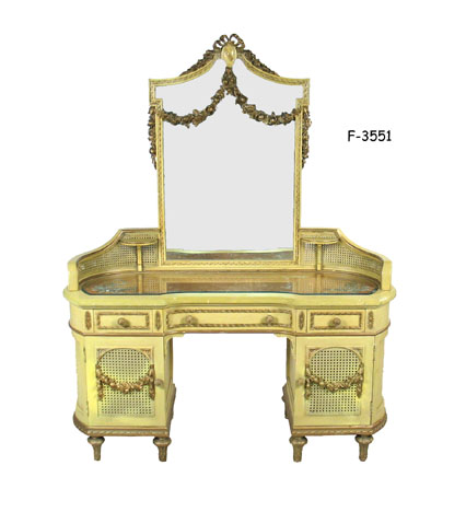 DRESSER/MIRROR: 1920's French Louis XVI style, mirror w/floral garland decor & 2 curved cane sides, whatnot shelf on each side, base w/beveled glass over satin pressed flowers, two cane doors w/gold festoon, 56 x 23 x 70-1/2"H SPECIAL PACKING