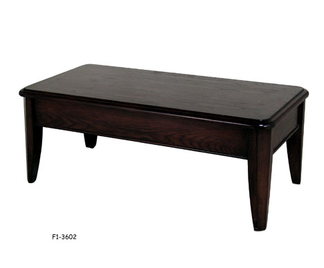 COFFEE TABLE: Dark mahogany finished ash, tapering legs. 24" x 48" x 18"H.