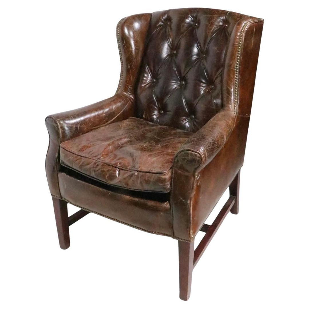 Vintage Wingback Chair in Patinated Brown Leather with Brass Nailhead Trim