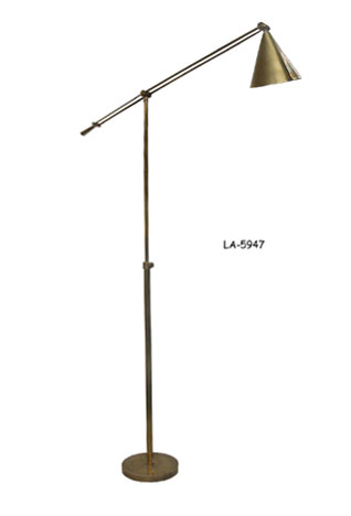 FLOOR LAMP: Natural brass cantilevered adjustable arm with cone shaped brass swivel shade on adjustable pole with thumb nut. Single bulb with attached cord. 9 1/4" round base, 60" H.